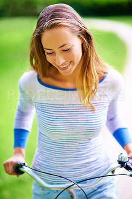 Buy stock photo Outdoor, cycling and woman with smile in park, recreation and leisure with enjoyment in Netherlands. Countryside, nature and bicycle as transportation, equipment and happy girl riding for fun