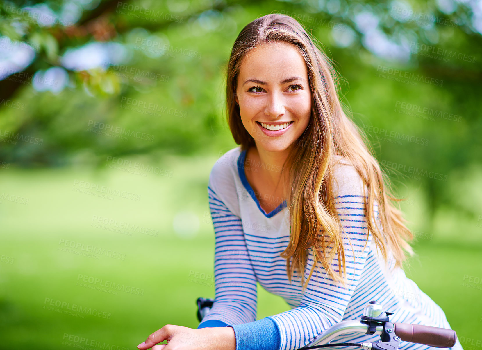 Buy stock photo Thinking, outdoor and girl with bike, smile and eco friendly travel with weekend break, happiness and cheerful. Cycling, park and woman in park, sustainability and joyful with summer, ideas or wonder