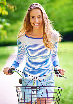 Buy stock photo Outdoor, bicycle and woman with smile in park, recreation and leisure with enjoyment in Netherlands. Countryside, nature and cycling as transportation, equipment and happy girl riding for fun