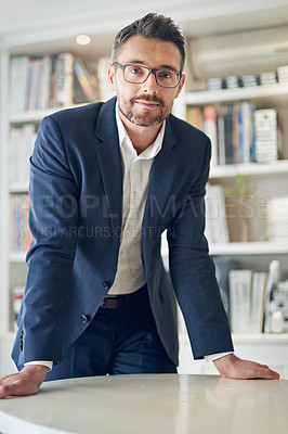 Buy stock photo Cropped portrait of a businessman in his office