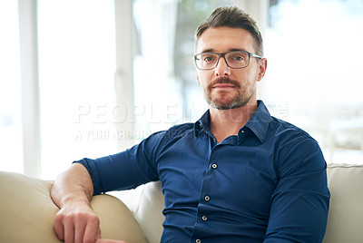 Buy stock photo Businessman, glasses and portrait on sofa in airport for work, relax and out of town startup project. Male person, corporate and unwind on couch in waiting room for international, travel and company 