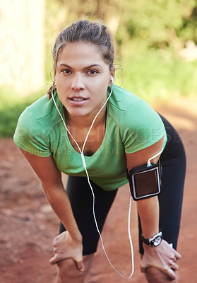Buy stock photo Woman, portrait and running break in nature for fitness, exercise and workout with music on mobile. Young person or runner in Australia with phone for music streaming and outdoor training or cardio