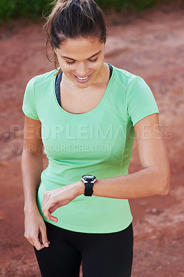 Buy stock photo Woman, fitness and check smart watch in nature for workout goals, running and cardio results. Sports person or runner check timer or stopwatch for exercise, training and health progress in forest