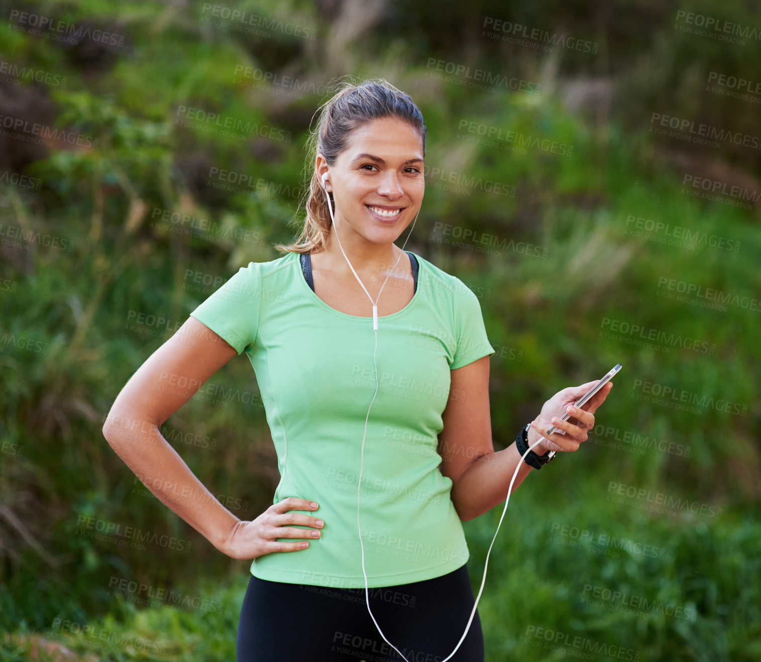 Buy stock photo Woman, portrait and listening to music for outdoor fitness, exercise and workout with mobile in forest. Happy, young person or runner in Australia with phone and audio for training or cardio in woods