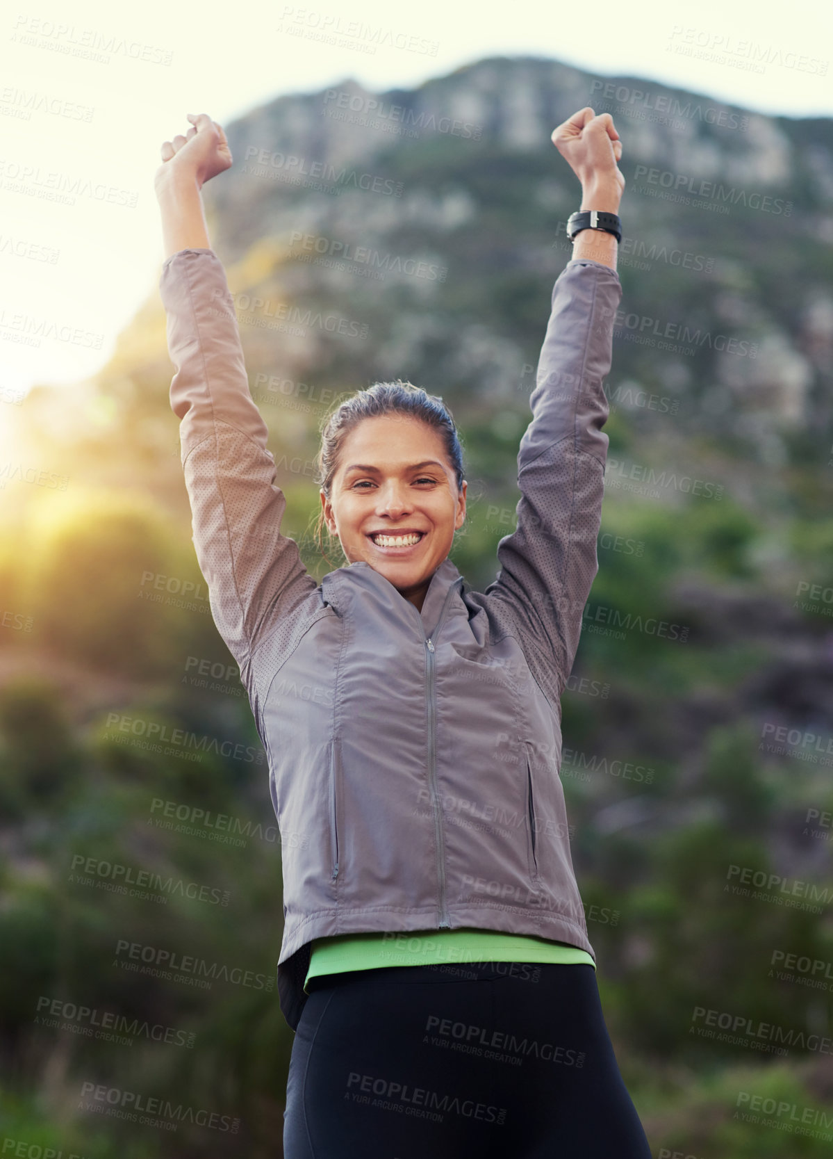 Buy stock photo Woman, success and yes in nature for fitness goals, exercise and running achievement in portrait. Excited Mexican runner with arms up, fist or power for winning race, health and wellness on mountains