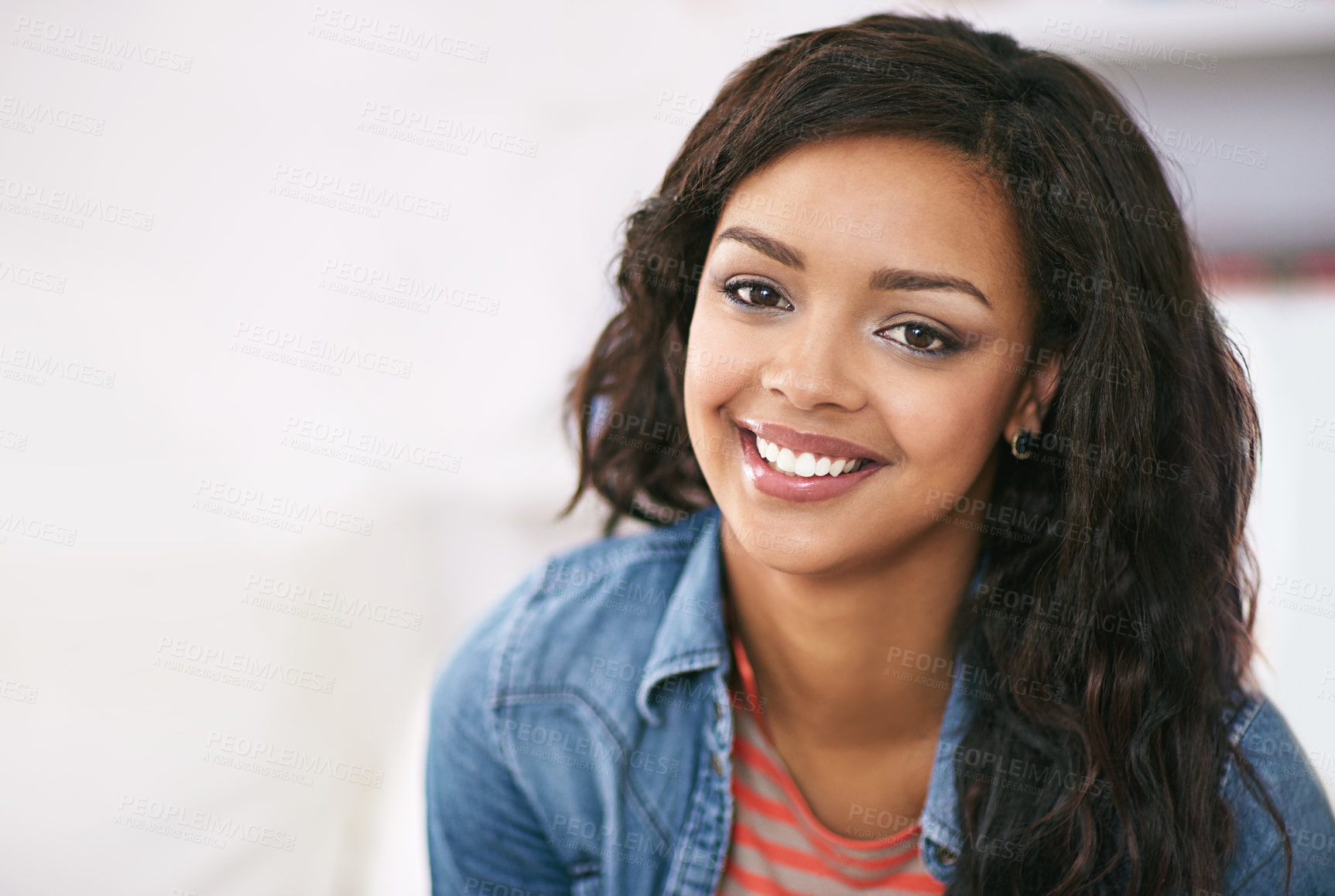 Buy stock photo Portrait of a young woman relaxing at home