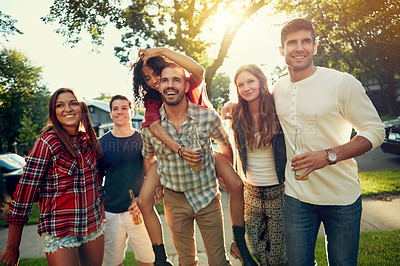 Buy stock photo Shot of friends spending time together outdoors