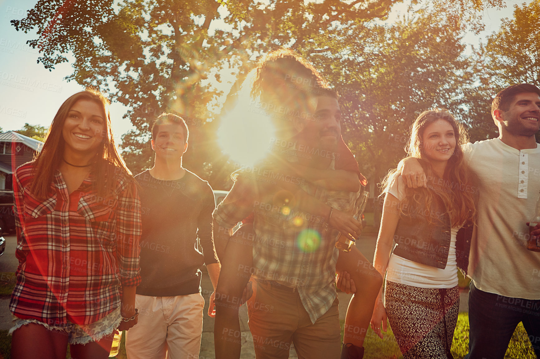 Buy stock photo Shot of friends spending time together outdoors