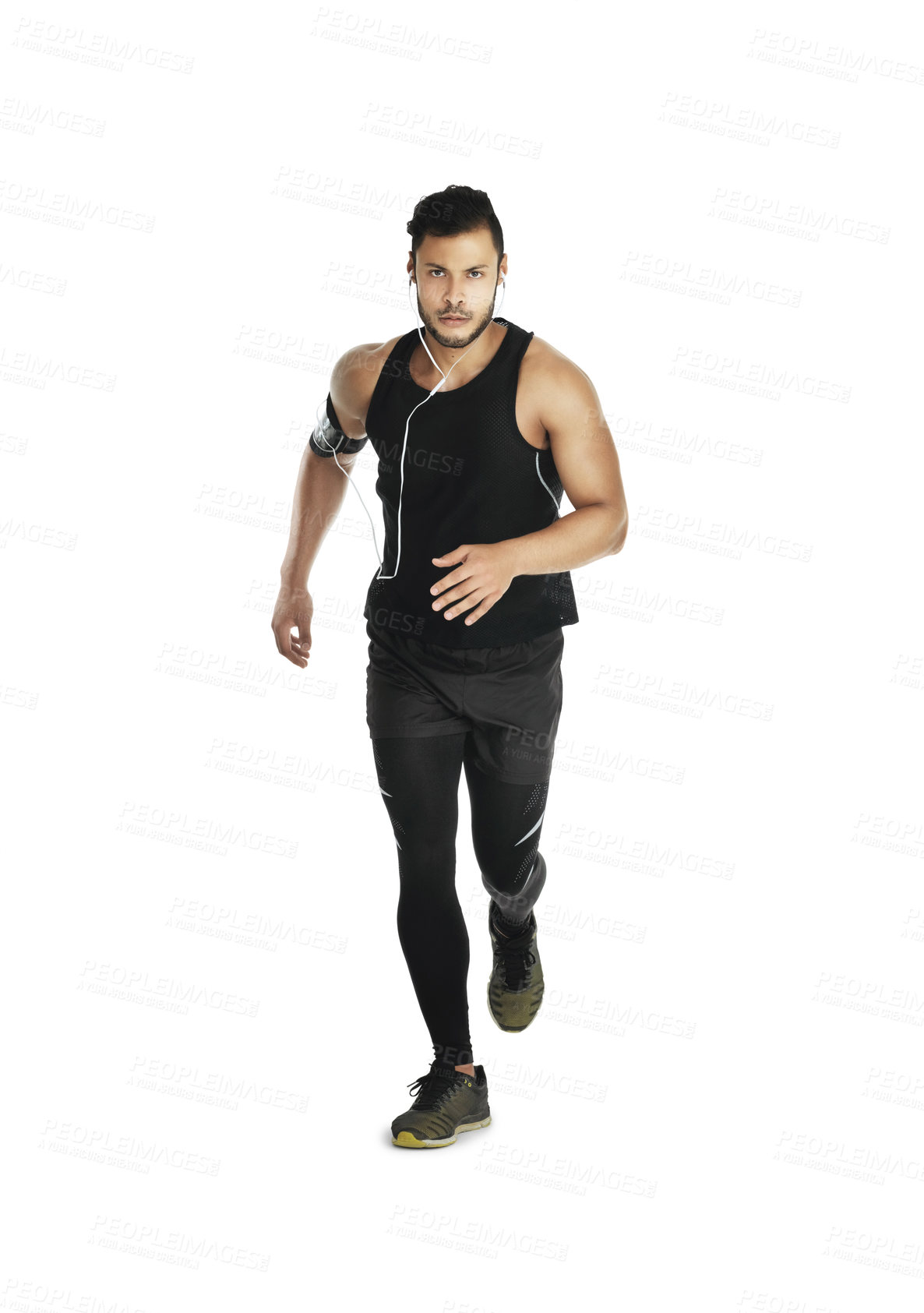 Buy stock photo Studio shot of a young man running against a white background