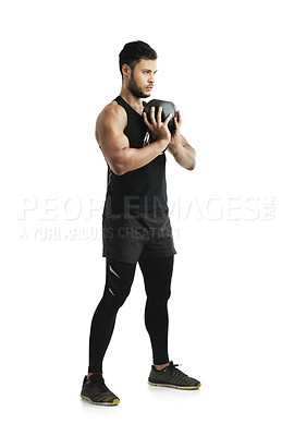 Buy stock photo Man, fitness and training with kettlebell in studio for muscle, endurance and healthy body. Gym, equipment and serious person with strength for resilience, exercise and workout on white background