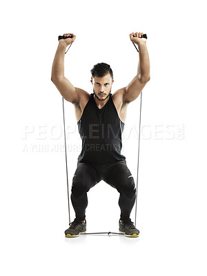 Buy stock photo Man, studio and exercise with resistance band for training or wellness, workout and fitness for bodybuilder. Male athlete, strong body and elastic for bicep, white background with gym in New Zealand