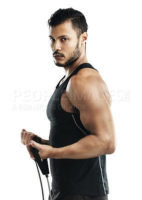 Buy stock photo Fit, man or athlete in portrait with resistance band in studio background for strength training or workout. Healthy, male person and gym equipment for bicep and forearm exercise with white backdrop