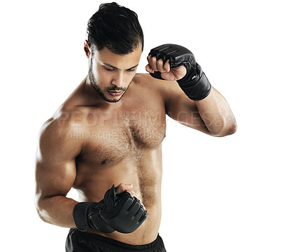 Buy stock photo Man, martial arts and gloves in studio for exercise, fitness or combat challenge by white background. Person, athlete and mma fighter in workout, training and action for contact sports in competition