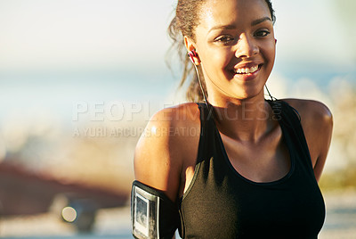 Buy stock photo Woman, portrait and outdoor exercise with earphones or arm running strap for podcast, fitness app or workout. Female person, face and smile for music streaming in summer, subscription or playlist