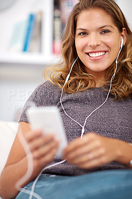 Buy stock photo Woman, house and headphones for music or relax with podcast, audio technology for wellness. Female person, playlist and earphones in home for happiness with smartphone, listening online for new sound