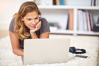 Buy stock photo Relax, streaming or girl on laptop in house to chill with internet connection for film, video or movie online. Carpet, break and woman on social media, blog and technology for subscription in home