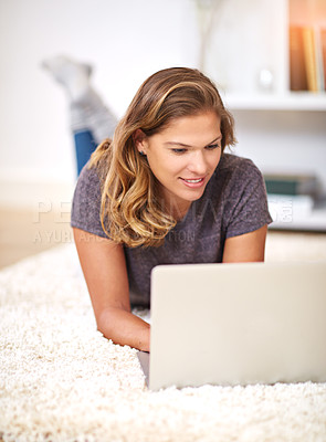 Buy stock photo Relax, streaming or woman on laptop in house to chill with internet connection for film, video or movie online. Carpet, break and girl on social media, blog and technology for subscription in home