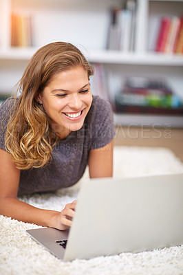 Buy stock photo Relax, happy or woman on laptop on carpet to chill with internet streaming for film, funny video or movie online. Ground, break and girl on social media, blog and technology for subscription in home