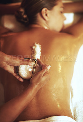 Buy stock photo Massage, salt and exfoliate for woman for treatment, spa and beauty salon for skincare and relax. Back, body scrub and hands of therapist, cosmetic and zen for stress relief and holistic therapy