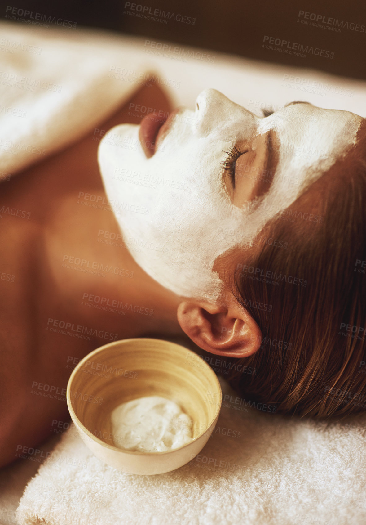 Buy stock photo Spa, face mask and woman with beauty, candles and skincare treatment at luxury hotel. Cosmetics, sleeping and calm client with anti aging and skin care with cream and facial lotion with wellness