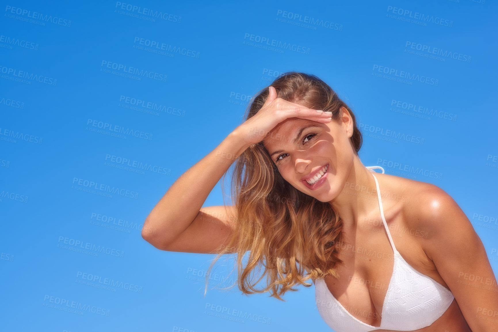 Buy stock photo Happy, woman and portrait with bikini at beach for vacation of tropical travel, summer peace and calm morning. Smile, female person and shading eyes of ocean sunshine, blue sky and island holiday