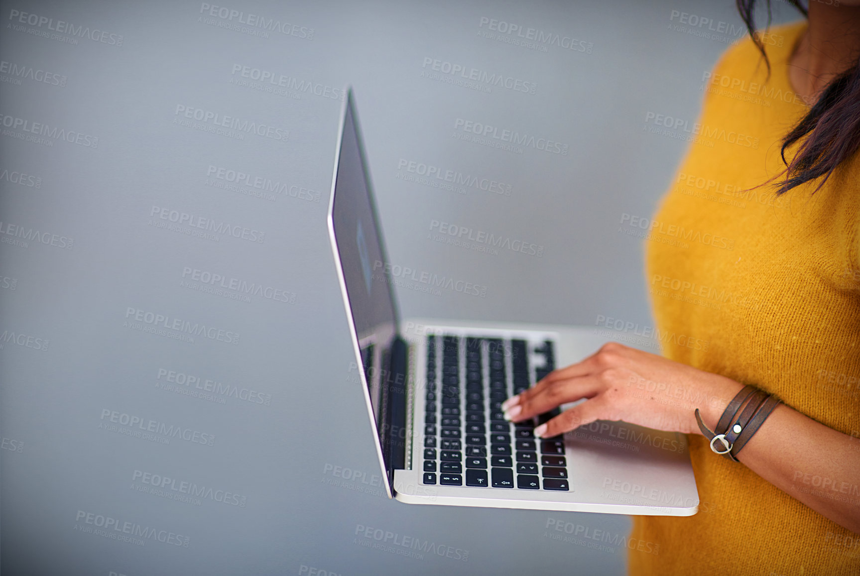 Buy stock photo Studio, mockup and hands of person with laptop for ecommerce, typing email and web information. Backdrop, electronic user and computer for digital search, connection and technology by gray background