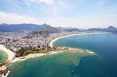 Buy stock photo Aerial view, ocean and buildings in city, outdoor and architecture in Brazil, tourism and destination. Morning, above and travel in Rio De Janeiro, water and explore in vacation and mountain in sea