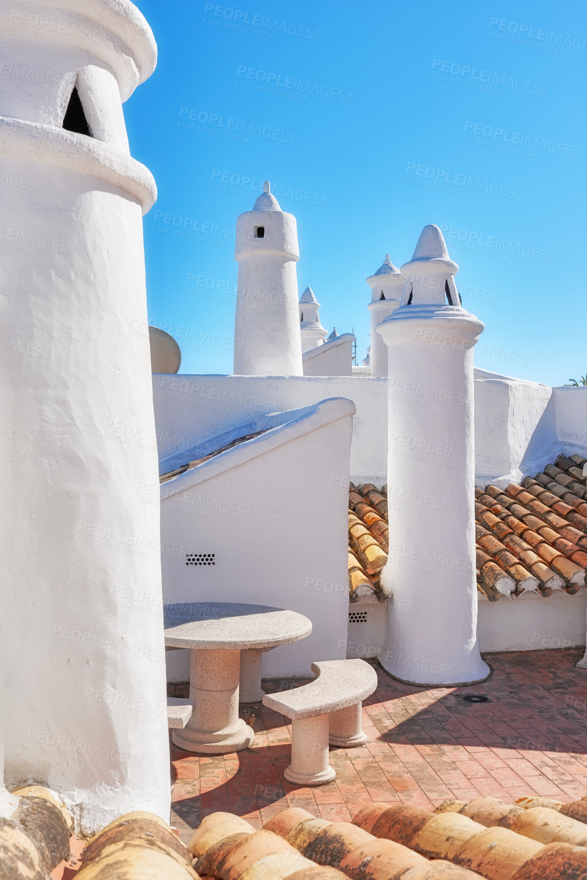 Buy stock photo Building, rooftop and terracotta with chimney, architecture and blue sky for ventilation with aesthetic. Culture, heritage and tiles with sustainability, insulation or eco friendly clay roof in Spain