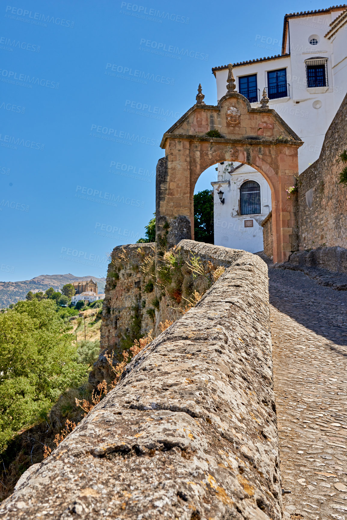 Buy stock photo Architecture, ancient and road in city of Spain for tourism, adventure and travel destination. Background, wall and vintage, old and street in town for culture, design and traditional infrastructure