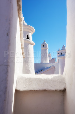 Buy stock photo Beautiful chimneys and ventilation tubes in the city of Colahonda, Andalusia, Spain