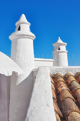 Buy stock photo Beautiful chimneys and ventilation tubes in the city of Colahonda, Andalusia, Spain