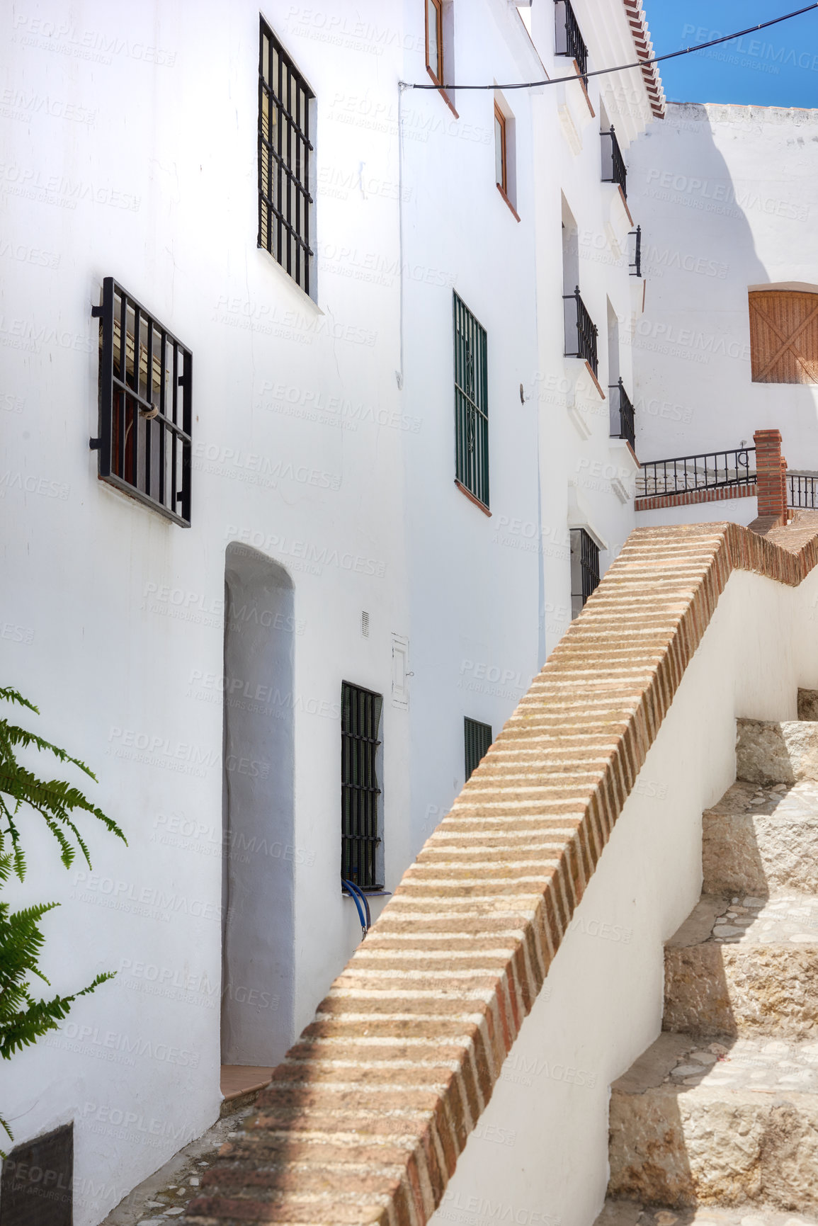 Buy stock photo Buildings, village and steps outdoor with architecture, travel and picturesque with vacation or aesthetic. Infrastructure, town and ancient culture for holiday, alley and tourist location in Spain