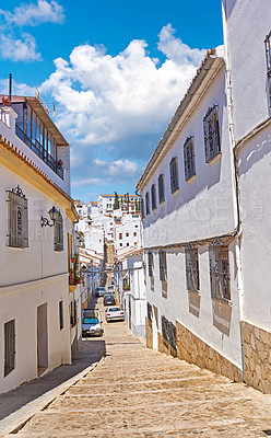 Buy stock photo Ancient, buildings and architecture for narrow street of village travel, history tourism and vintage location. Urban, neighborhood and city with traditional culture, holiday and destination in Spain