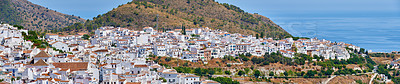 Buy stock photo Drone, city and outdoor to travel in Spain, Europe summer and mountains for peace in town. Buildings, architecture and culture in Frigiliana for tourism, holiday and calm environment on vacation