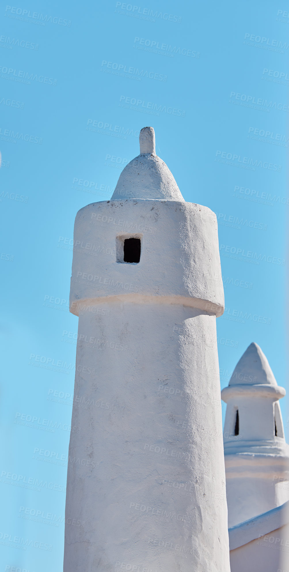 Buy stock photo Chimney, whitewash and architecture in city for wallpaper, buildings and village design for ventilation in Spain. Colahonda, stone structure and sky background on coast for heritage or aesthetic