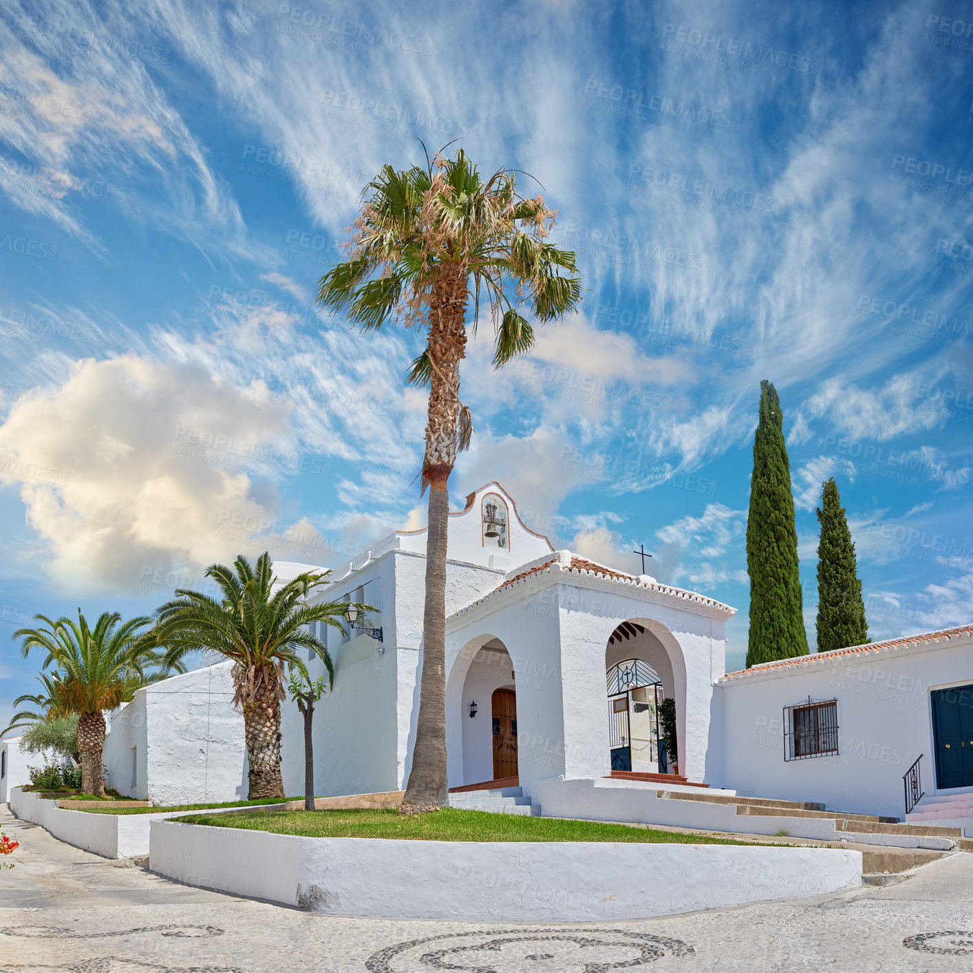 Buy stock photo Modern, church and building palm trees with blue sky of vintage travel, religious location and history pilgrimage. Architecture, traditional design and cultural structure, faith and worship in Spain