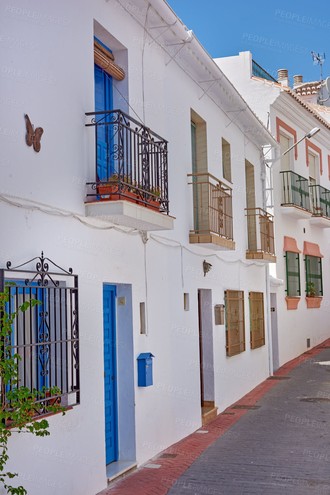 Buy stock photo Outside, houses and alley in neighborhood with traditional architecture in Italy. Outdoor, home and corridor in village with cultural or vintage design as holiday or vacation destination for tourism