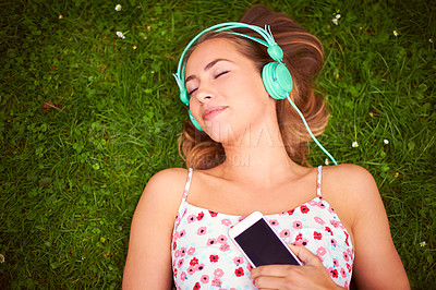 Buy stock photo Relax, woman and headphones on grass for music, media and podcast or website on campus. College student, smartphone and calm in backyard or garden for streaming, online and audio or ebook for peace