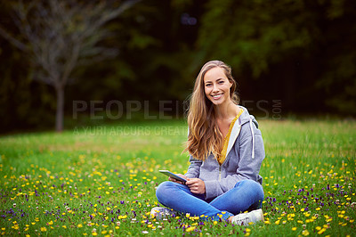 Buy stock photo Woman, tablet and happy portrait on grass with relax for reading ebook, spring break and connection. Female student, smile and digital tech in park for online game, social media and streaming movies