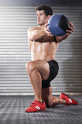 Buy stock photo Fitness, health and man training with medicine ball for weight lifting, muscle endurance and strength workout. Sports, male bodybuilder and athlete in gym for strong body, cardio, and wellness