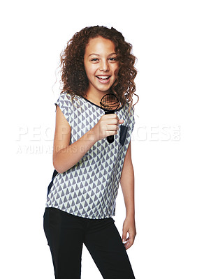 Buy stock photo Studio shot of a girl singing into an imaginary microphone against a white background