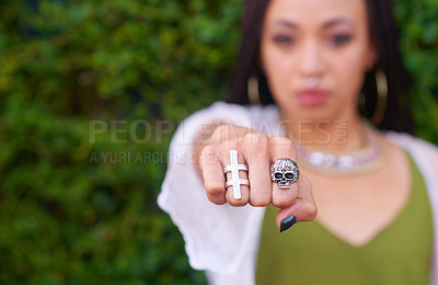 Buy stock photo Closeup shot of a woman with rings on her fingers