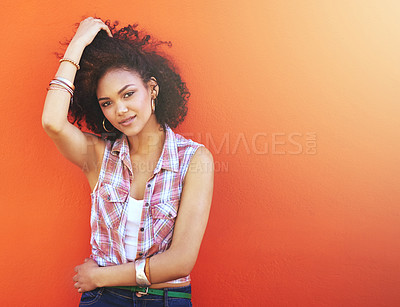 Buy stock photo Shot of an attractive young woman posing against a colorful background