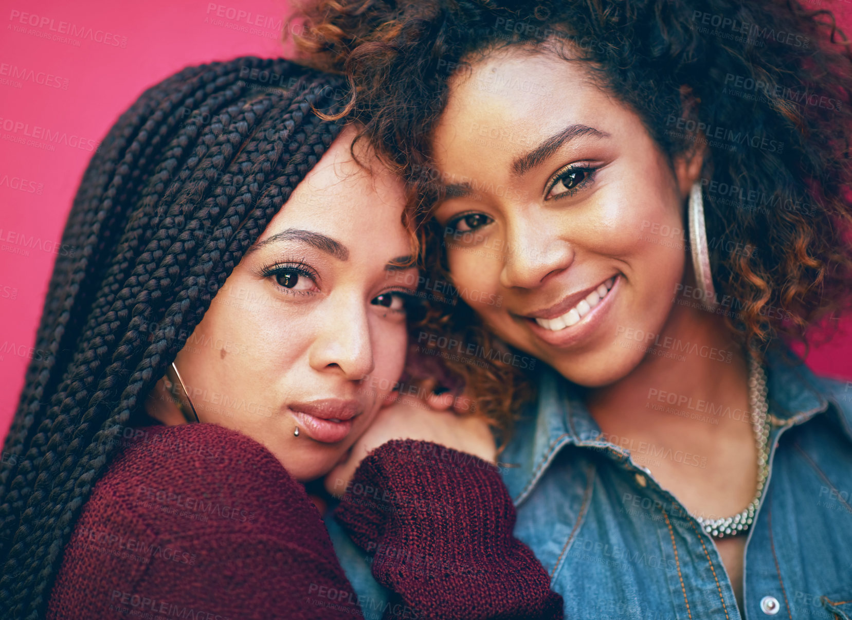 Buy stock photo Portrait of two girlfriends posing against a pink background