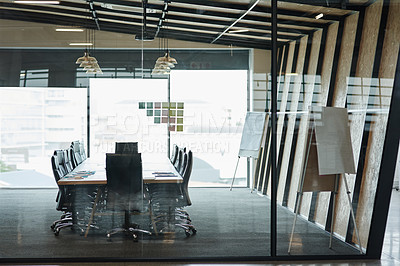 Buy stock photo Shot of an empty boardroom