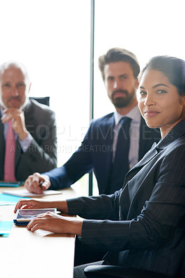 Buy stock photo Confident, corporate and motivated businesspeople sitting together in a boardroom during a meeting. Great leadership and teamwork in an office. Portrait of a female entrepreneur and executives