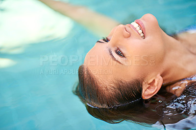 Buy stock photo Swimming pool, happy and woman relax on holiday, vacation and weekend at hotel resort. Luxury hospitality, travel and person floating with smile for wellness, health and resting in water to chill