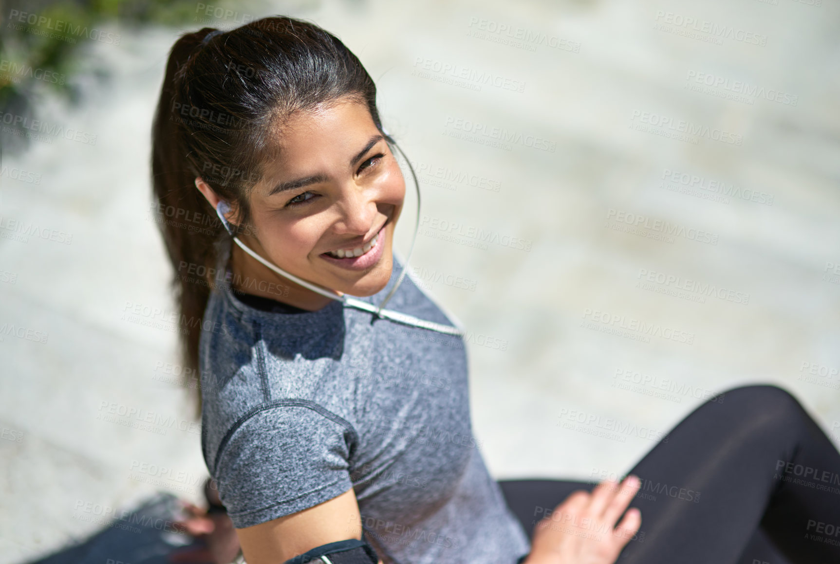 Buy stock photo Happy woman, portrait and fitness with headphones for break, relax or listening to music on stairs in city. Female person with smile or earphones on steps for podcast, playlist or audio after workout