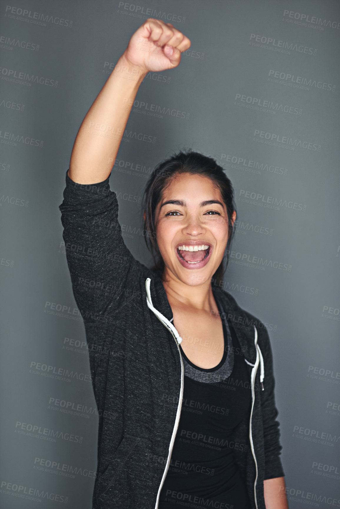 Buy stock photo Woman, portrait and celebration for fitness in studio with workout success, wellness achievement and excited. Person, sportswear and energy for winning or victory with confidence on grey background