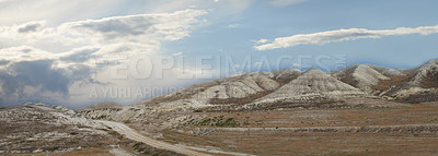 Buy stock photo Landscape, nature and sky with mountain outdoor in ecosystem, environment or habitat for tourism. Earth, desert and sustainability with rocky terrain in location for sightseeing or travel in Turkey 